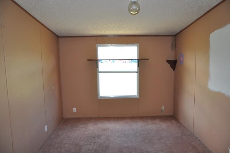 9960 Bellbrook Road Milton, FL 32583 - Photo 24 of 29 an empty room with a window
