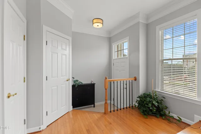 a view of empty room with floor to ceiling window