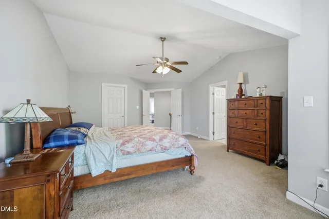 a bedroom with a bed and furniture