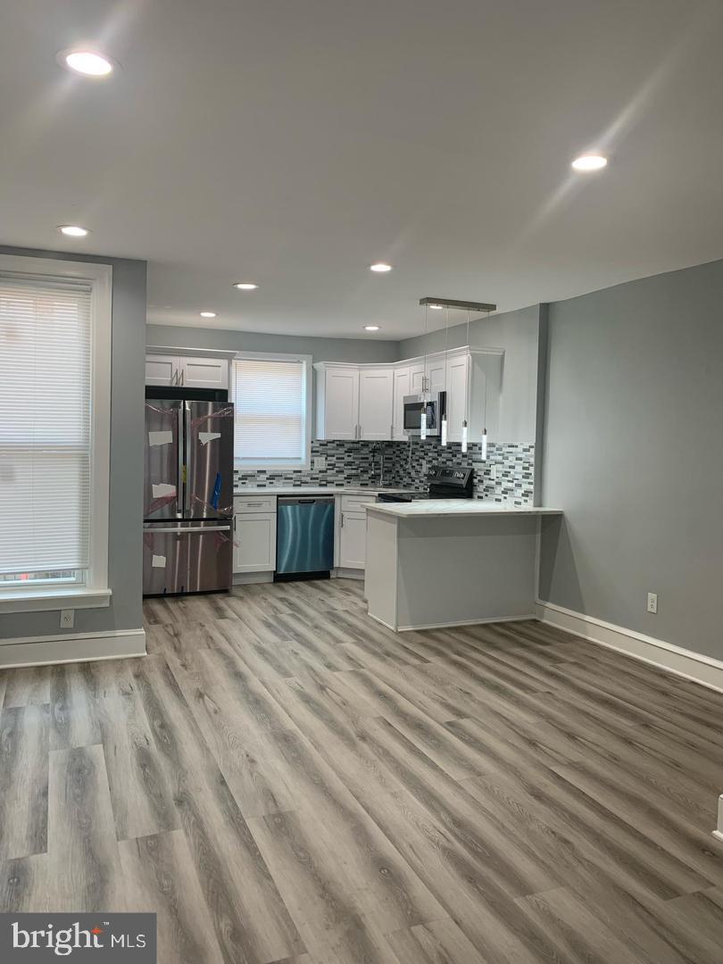 912 Anchor Street Philadelphia, PA 19124 - Photo 14 of 14 a view of kitchen with wooden floor