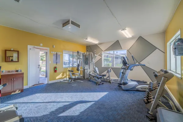 a view of a room with gym equipment