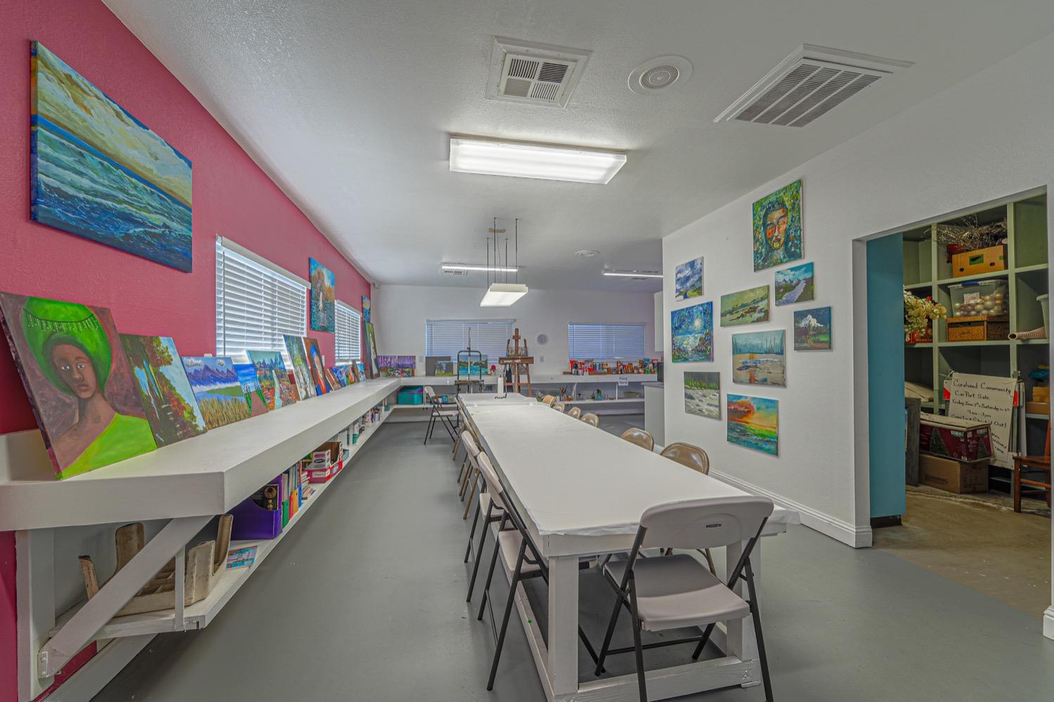 167 Clipper Lane Modesto, CA 95356 - Photo 19 of 23 a dining room with furniture and a floor to ceiling window