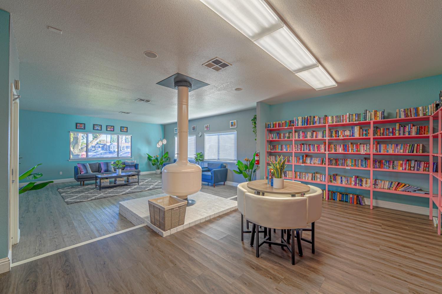 167 Clipper Lane Modesto, CA 95356 - Photo 20 of 23 a living room with furniture and a book shelf