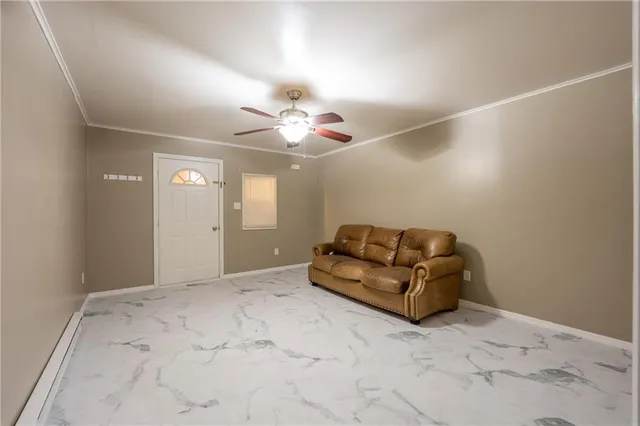 a view of a kitchen with a sink and a refrigerator