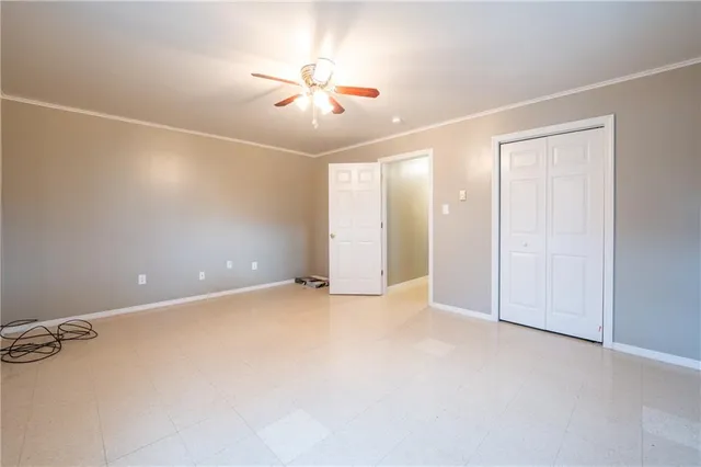 a bathroom with a toilet sink and a shower