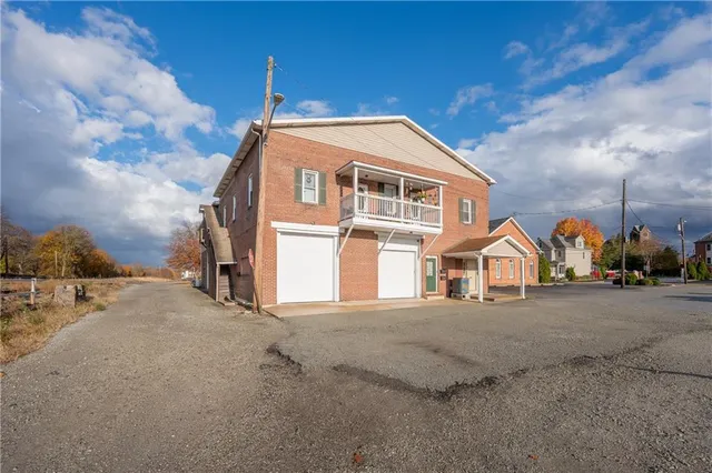 a living room with lots of furniture and cars