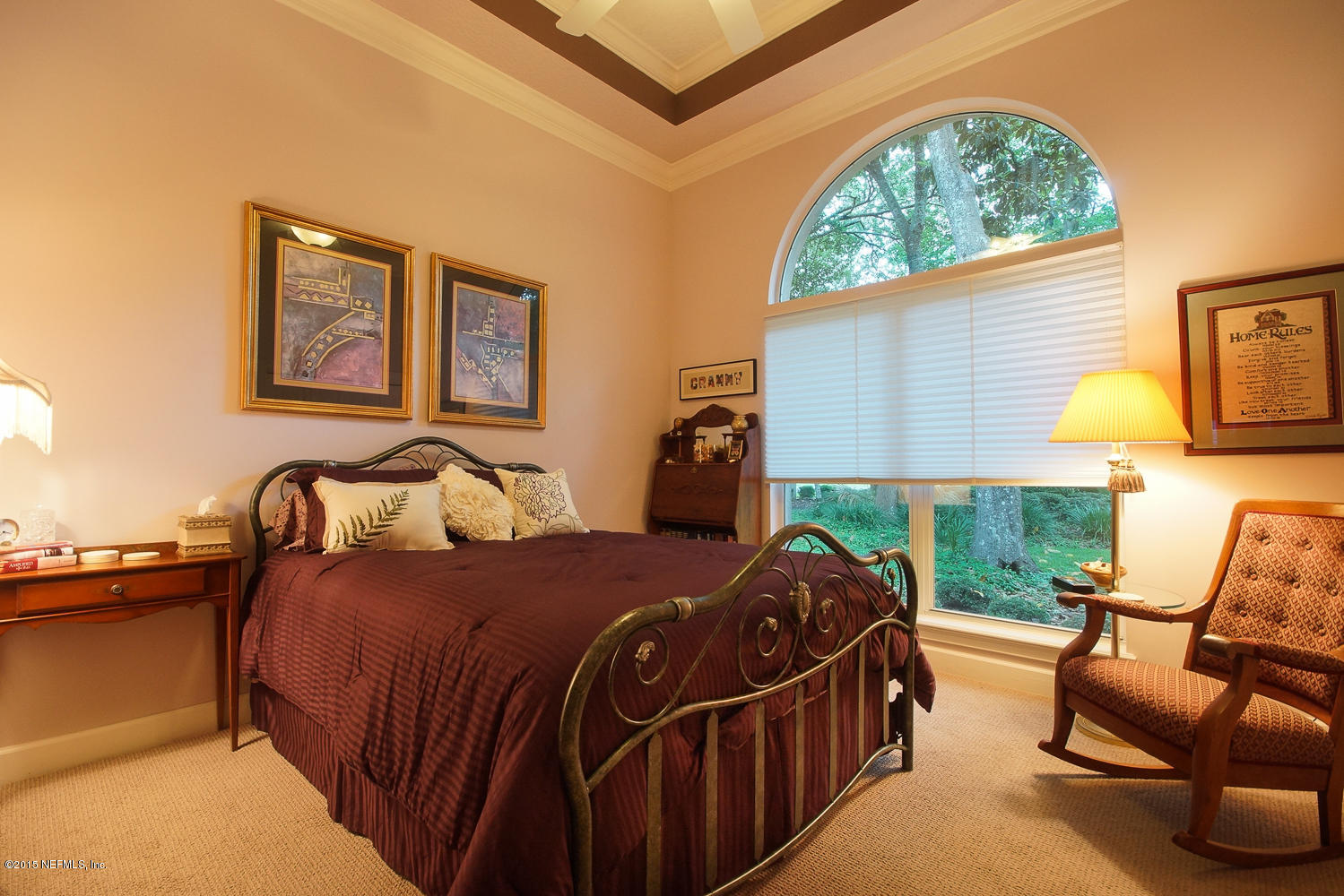 829 Queens Harbor Boulevard Jacksonville, FL 32225 - Photo 20 of 42 a bedroom with bed and wooden floor