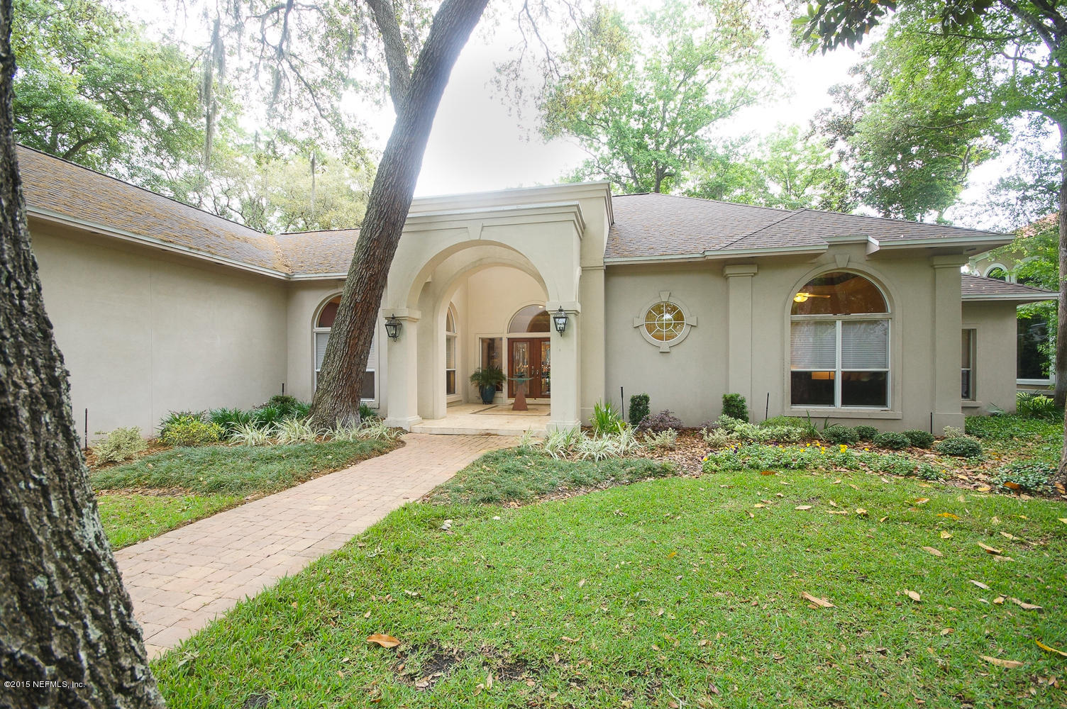 829 Queens Harbor Boulevard Jacksonville, FL 32225 - Photo 42 of 42 a front view of a house with garden