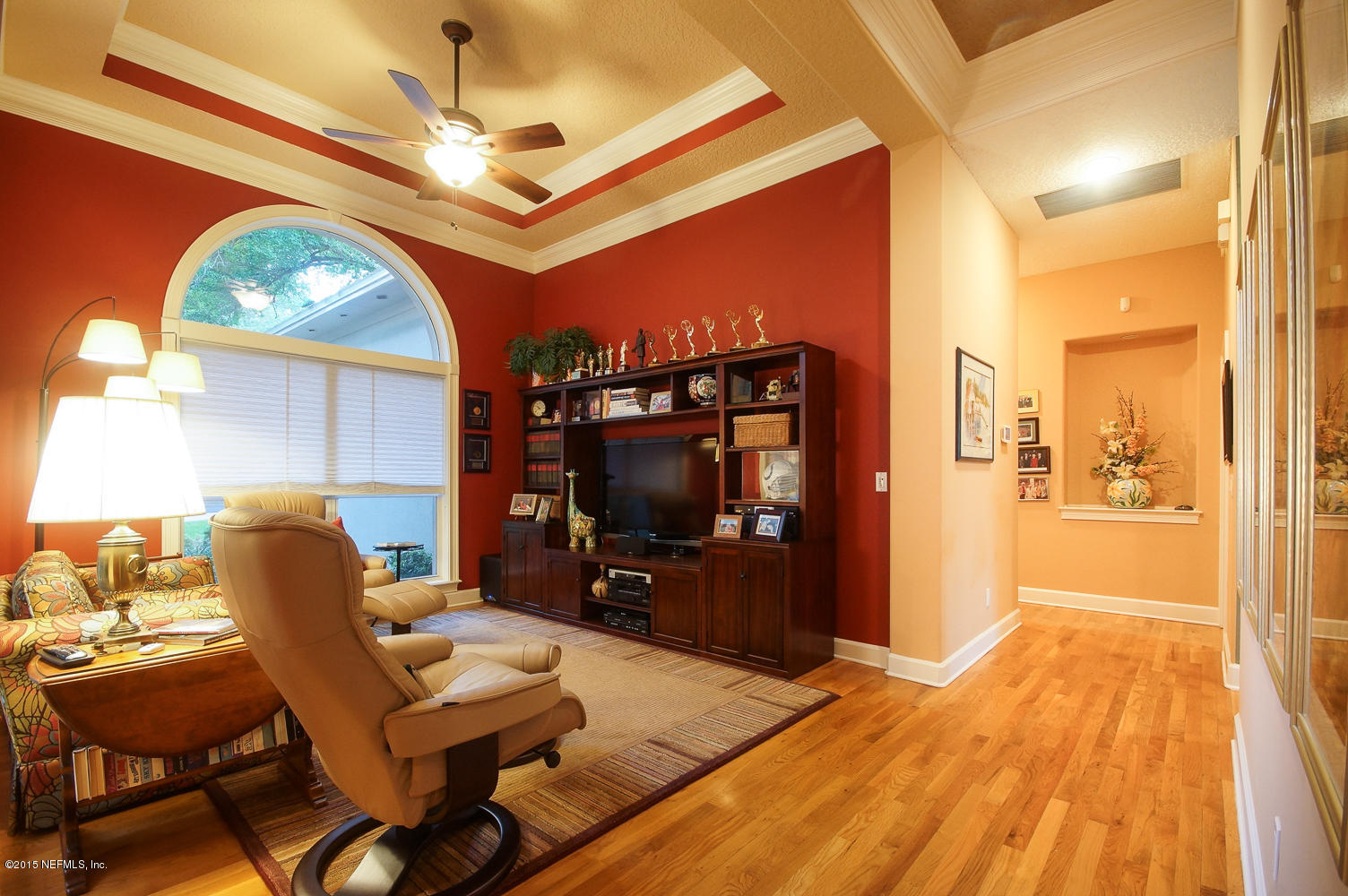 829 Queens Harbor Boulevard Jacksonville, FL 32225 - Photo 6 of 42 a living room with furniture and a flat screen tv
