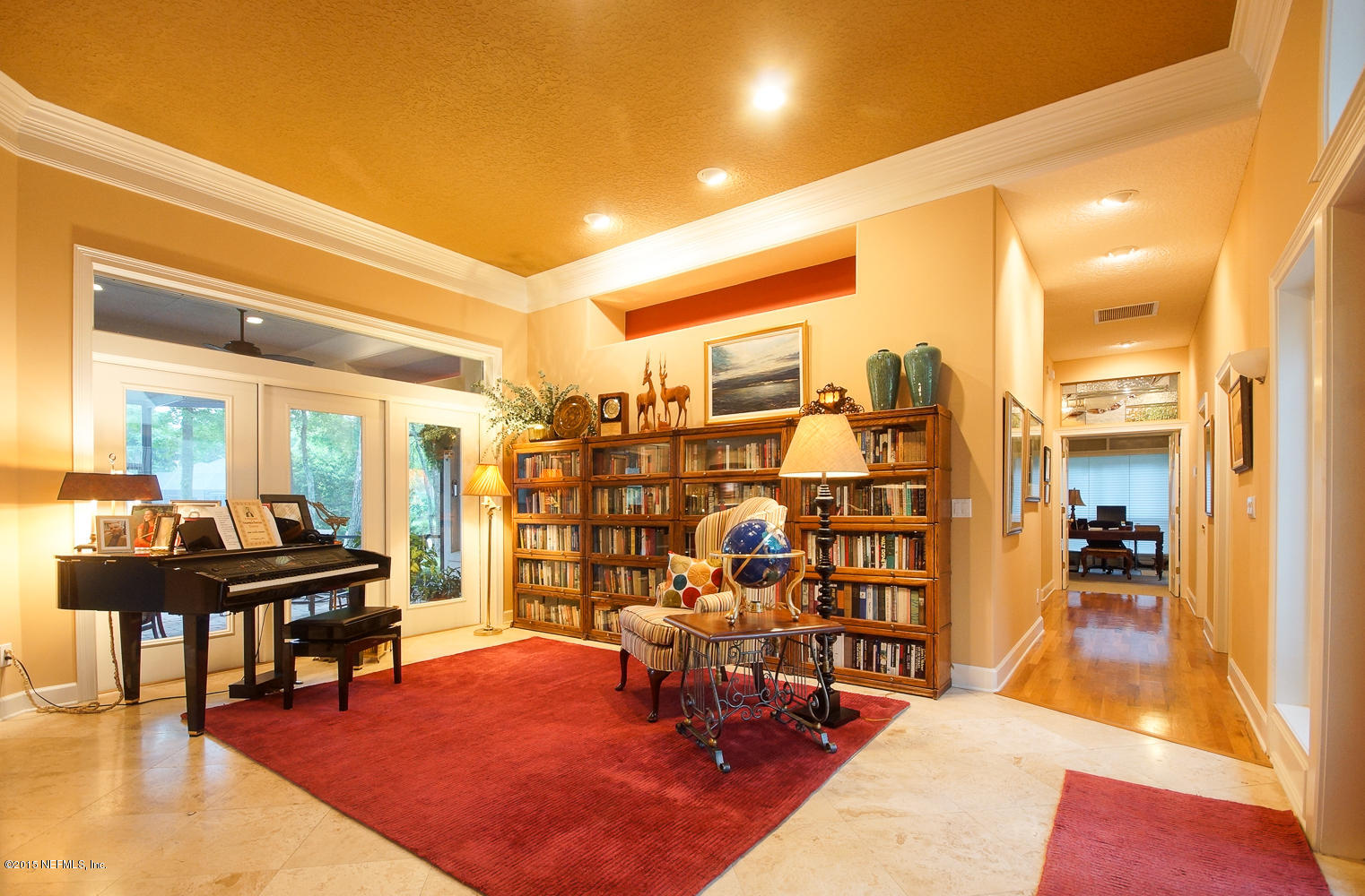829 Queens Harbor Boulevard Jacksonville, FL 32225 - Photo 7 of 42 a living room with lots of furniture and white walls