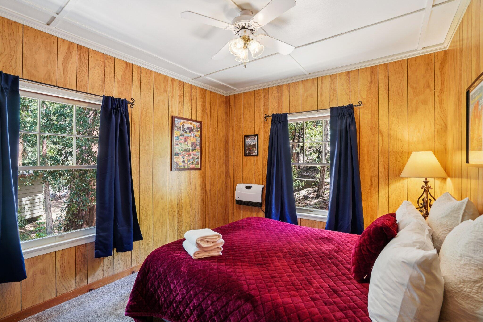 55280 Circle Way Idyllwild, CA 92549 - Photo 19 of 27 a bedroom with a large bed and a window