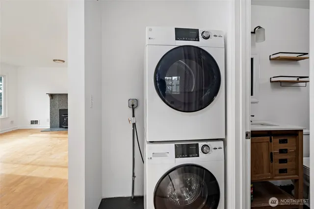 a view of livingroom with washer and dryer