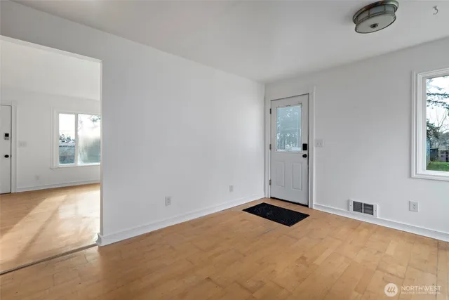 an empty room with windows