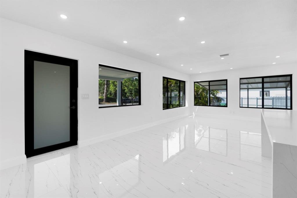 16011 Northwest 38th Court Opa-Locka, FL 33054 - Photo 15 of 38 a view of an entryway with wooden floor