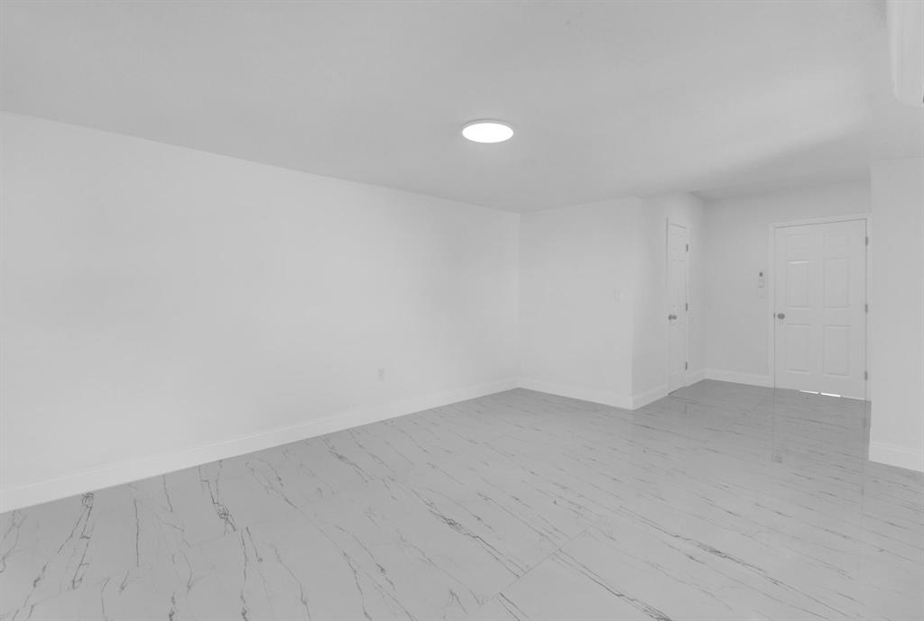 16011 Northwest 38th Court Opa-Locka, FL 33054 - Photo 25 of 38 a view of an empty room