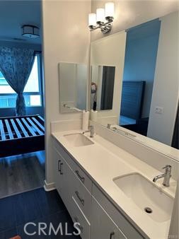 9044 Garvey Avenue, Unit 21 Rosemead, CA 91770 - Photo 13 of 20 a bathroom with a sink and a mirror