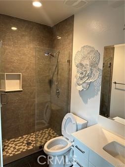 9044 Garvey Avenue, Unit 21 Rosemead, CA 91770 - Photo 15 of 20 a bathroom with a sink a toilet and shower