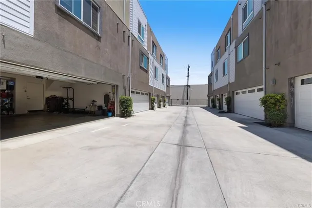 a view of a building with a yard