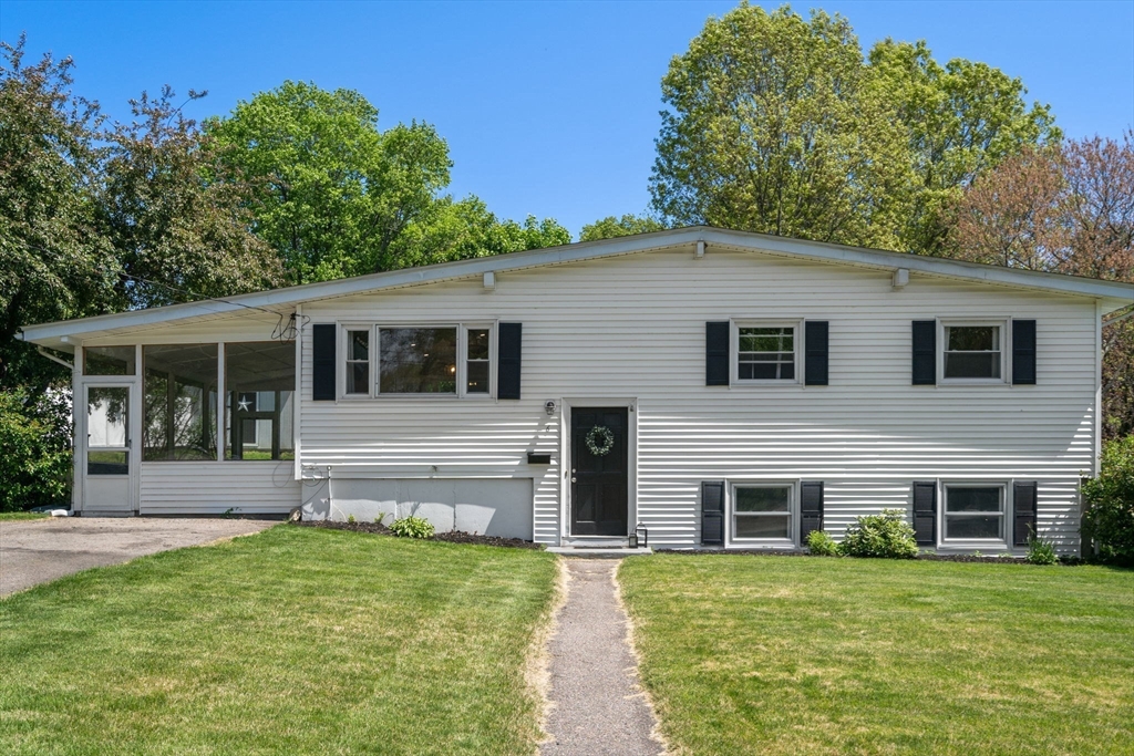 6 Rosenfeld Road Millis, MA 02054 - Photo 1 of 23 a front view of a house with a yard