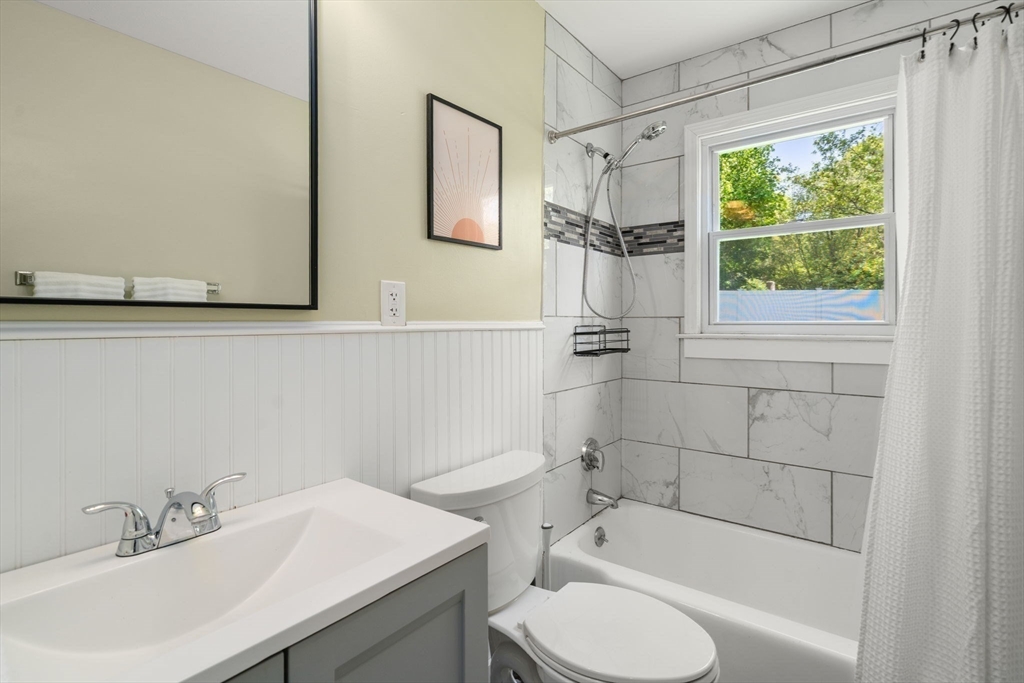 6 Rosenfeld Road Millis, MA 02054 - Photo 14 of 23 a bathroom with a sink toilet and shower