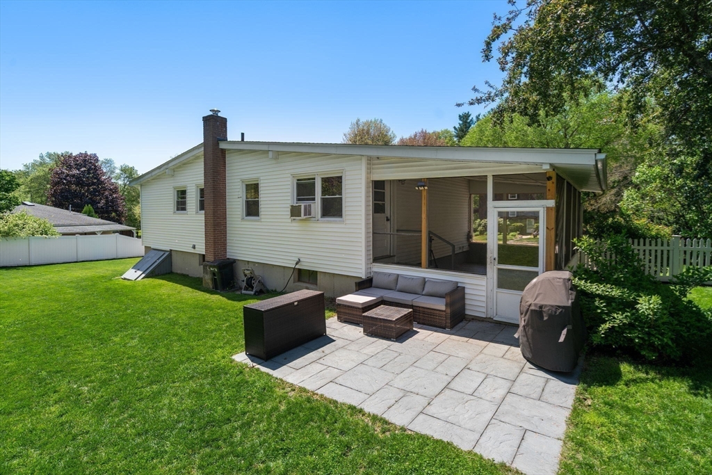 6 Rosenfeld Road Millis, MA 02054 - Photo 19 of 23 a front view of a house with garden