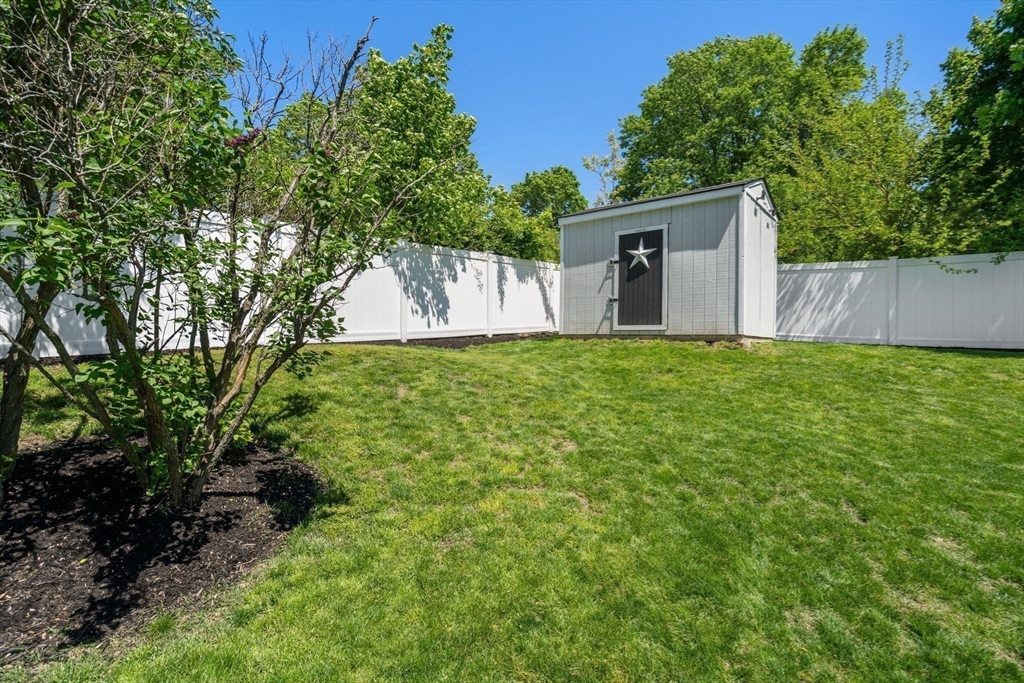 6 Rosenfeld Road Millis, MA 02054 - Photo 20 of 23 a view of a back yard
