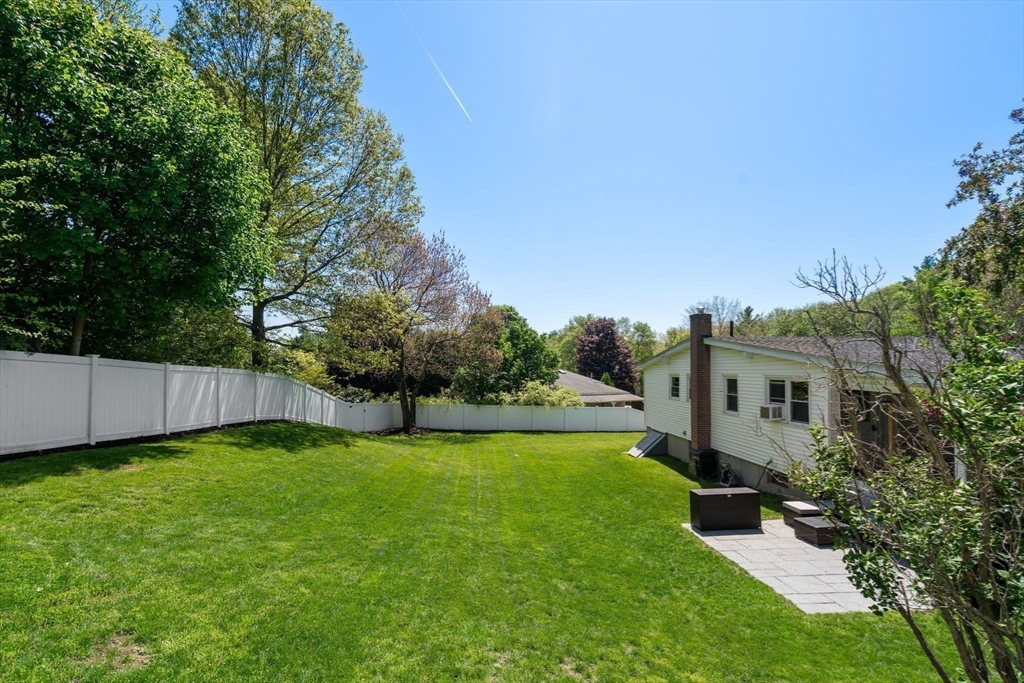 6 Rosenfeld Road Millis, MA 02054 - Photo 21 of 23 a view of a house with a yard and a fountain