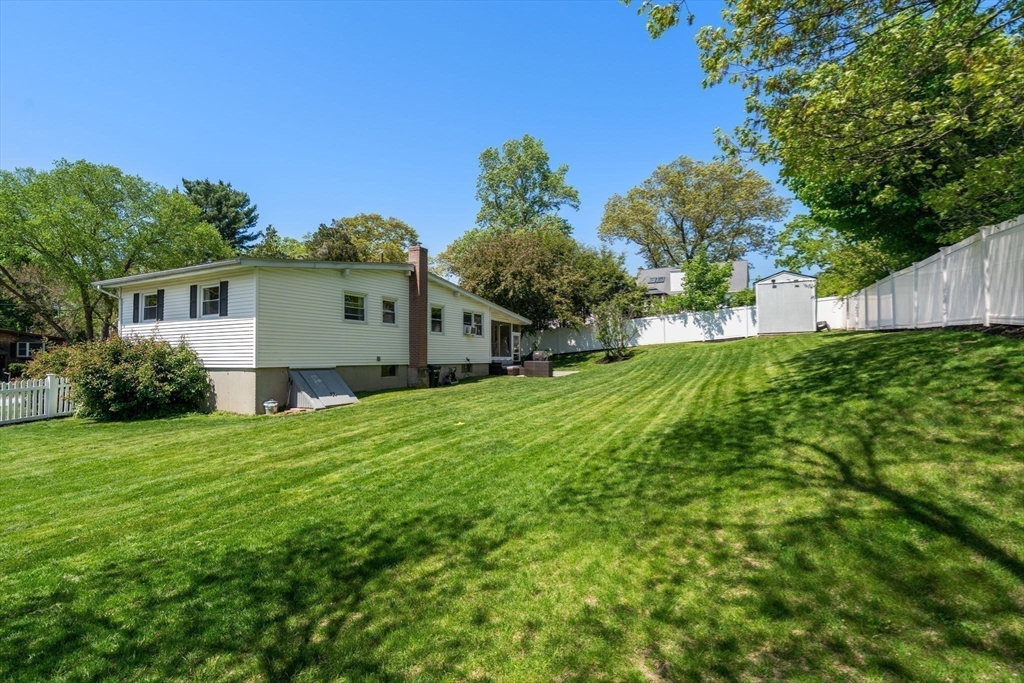 6 Rosenfeld Road Millis, MA 02054 - Photo 23 of 23 a house view with a garden space