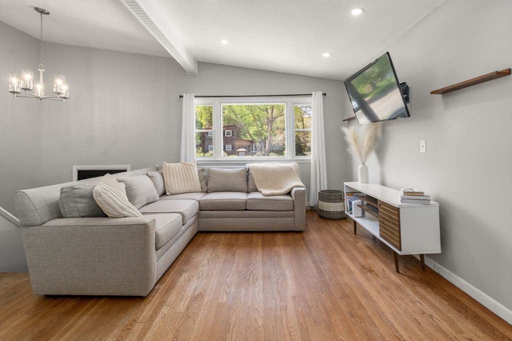 6 Rosenfeld Road Millis, MA 02054 - Photo 7 of 23 a living room with furniture and a large window