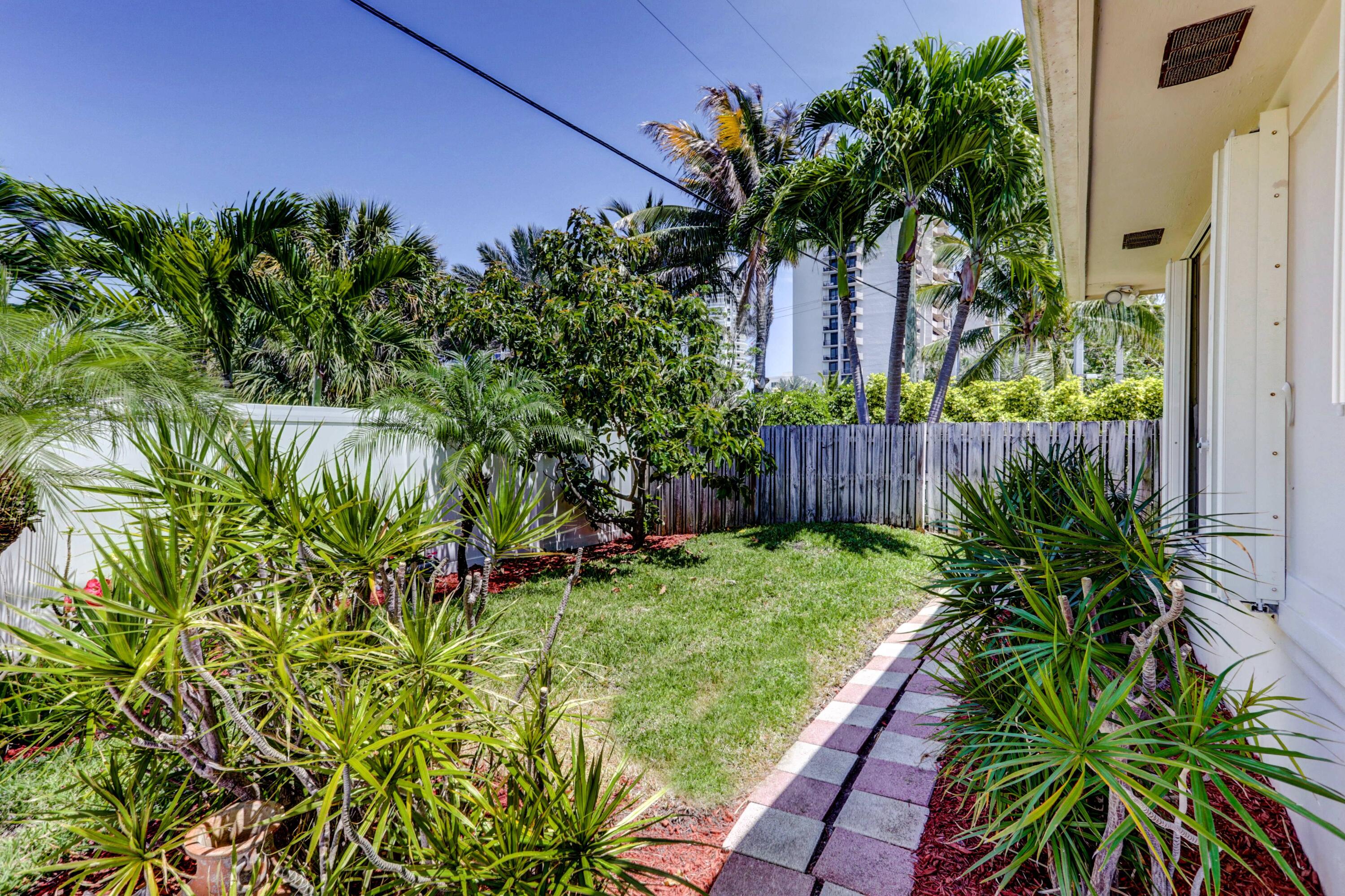 1260 Gulfstream Way Singer Island, FL 33404 - Photo 56 of 64 SIDE OF HOUSE