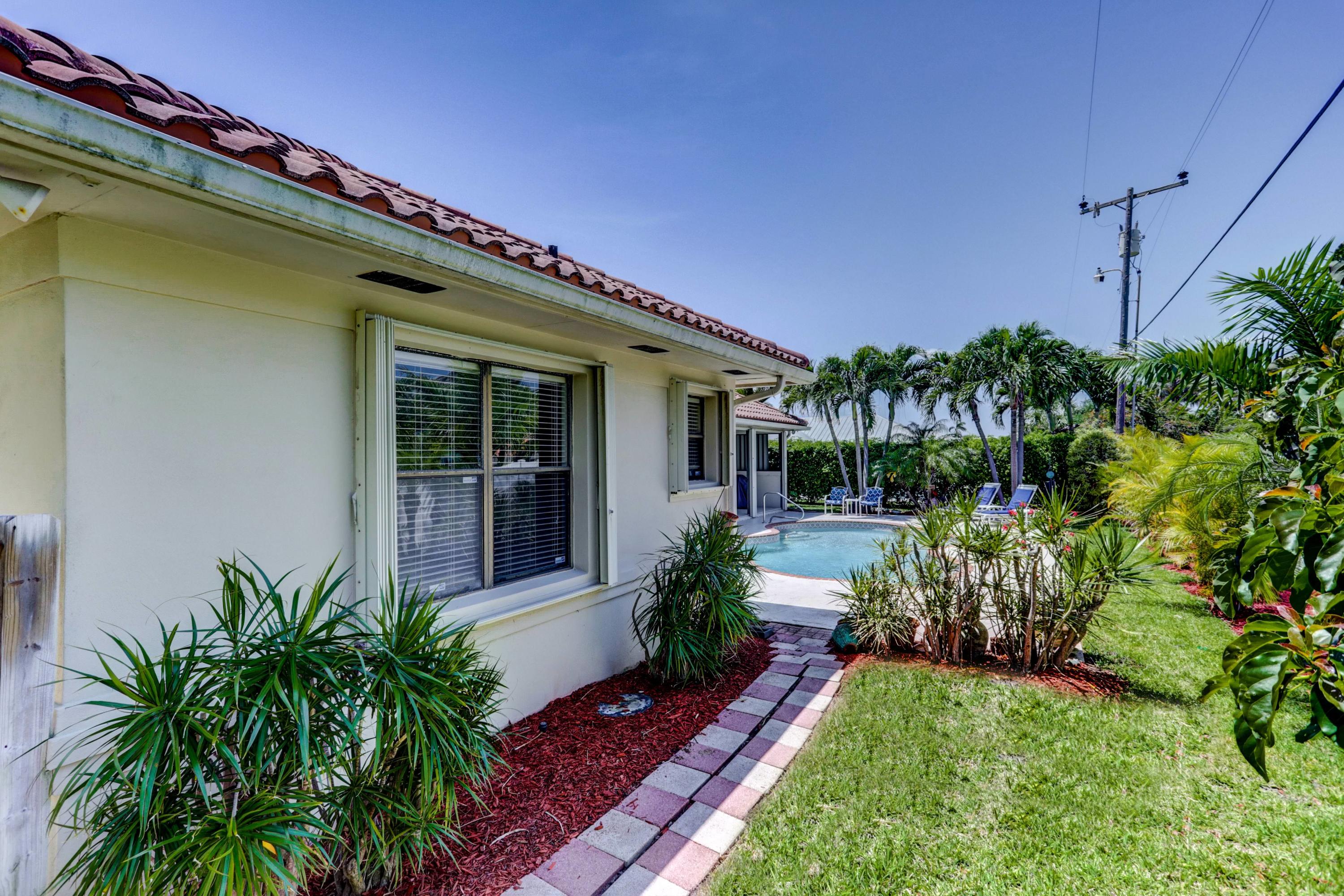 1260 Gulfstream Way Singer Island, FL 33404 - Photo 57 of 64 SIDE VIEW