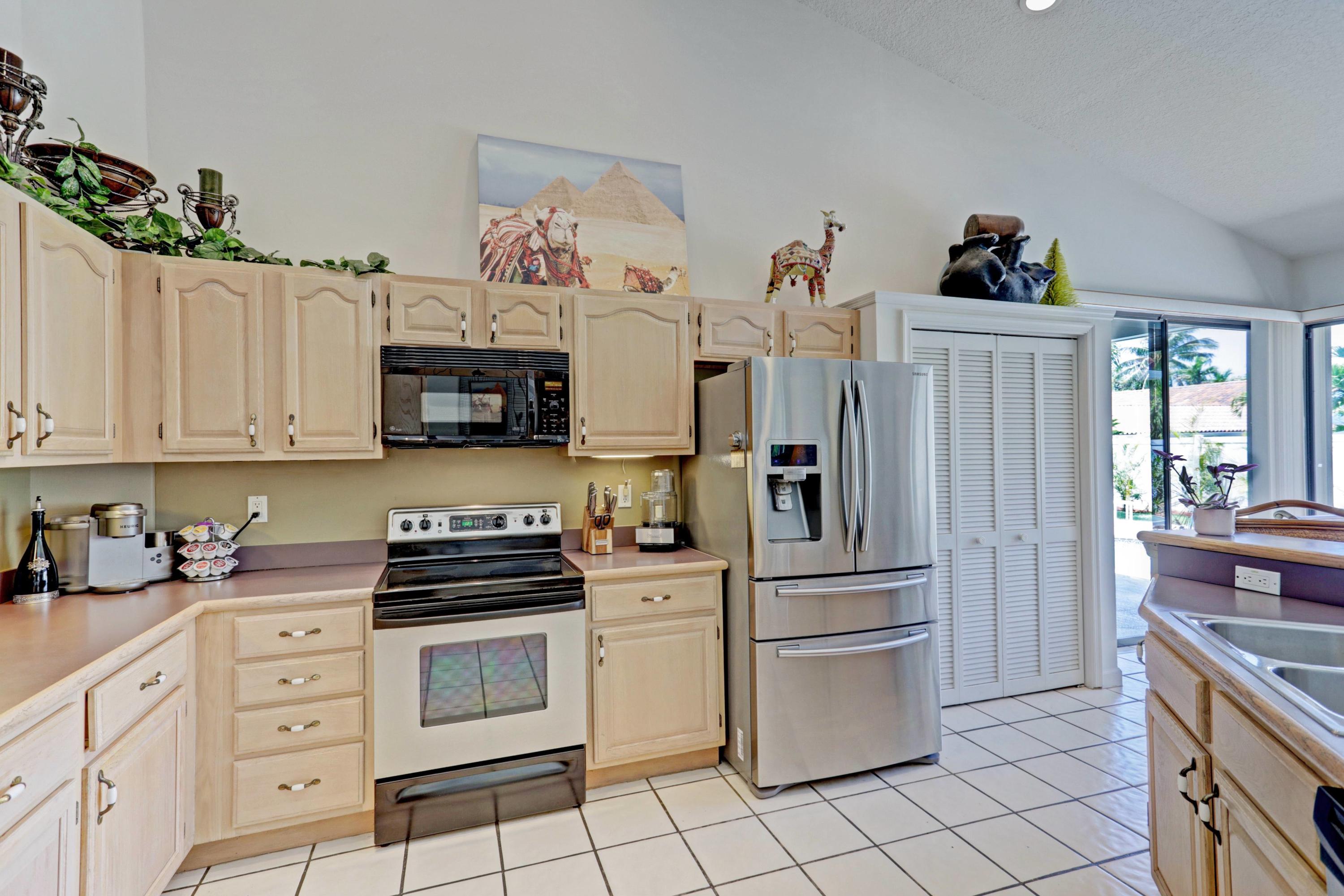 1260 Gulfstream Way Singer Island, FL 33404 - Photo 9 of 64 OPEN KITCHEN