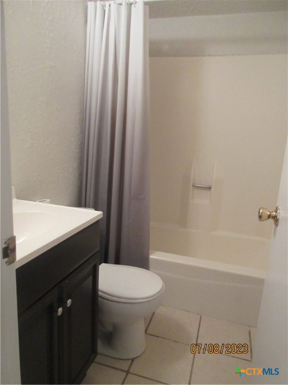 2904 Lake Road, Unit 12 Killeen, TX 76543 - Photo 5 of 7 a bathroom with a sink a toilet and shower