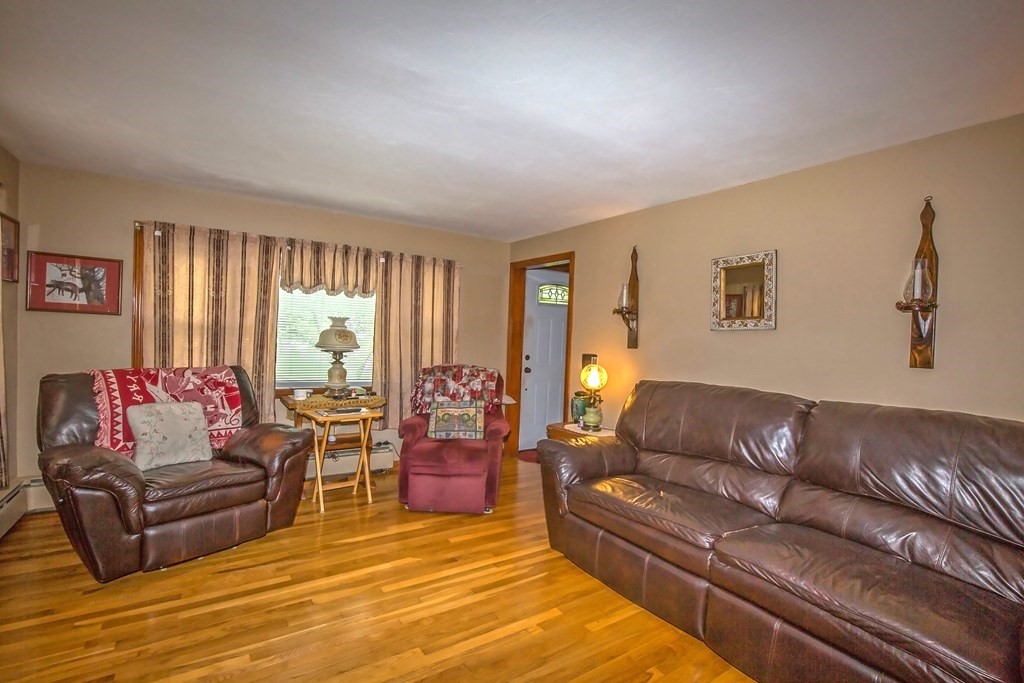 165 Bacon Road Springfield, MA 01119 - Photo 13 of 40 a living room with furniture and a large window