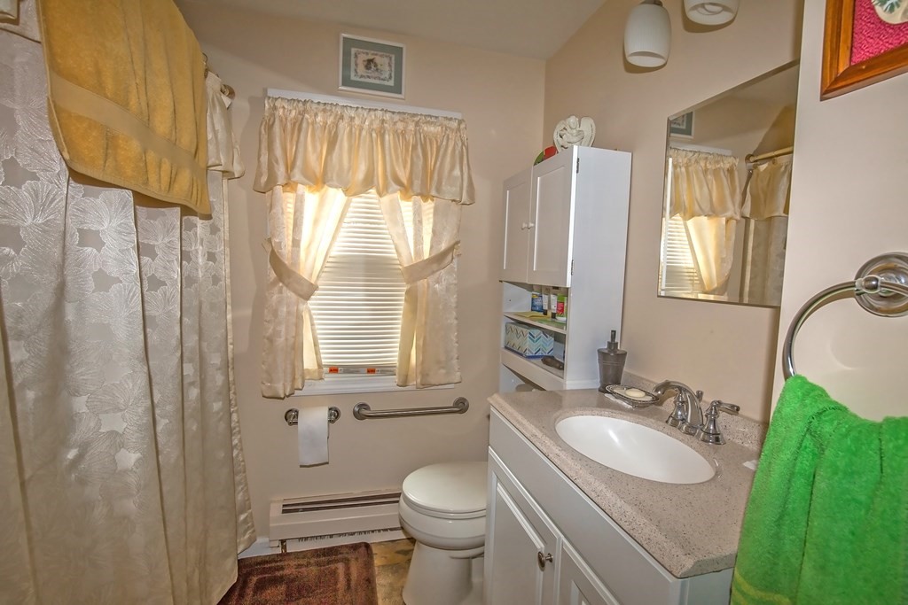 165 Bacon Road Springfield, MA 01119 - Photo 17 of 40 a bathroom with a sink toilet and shower