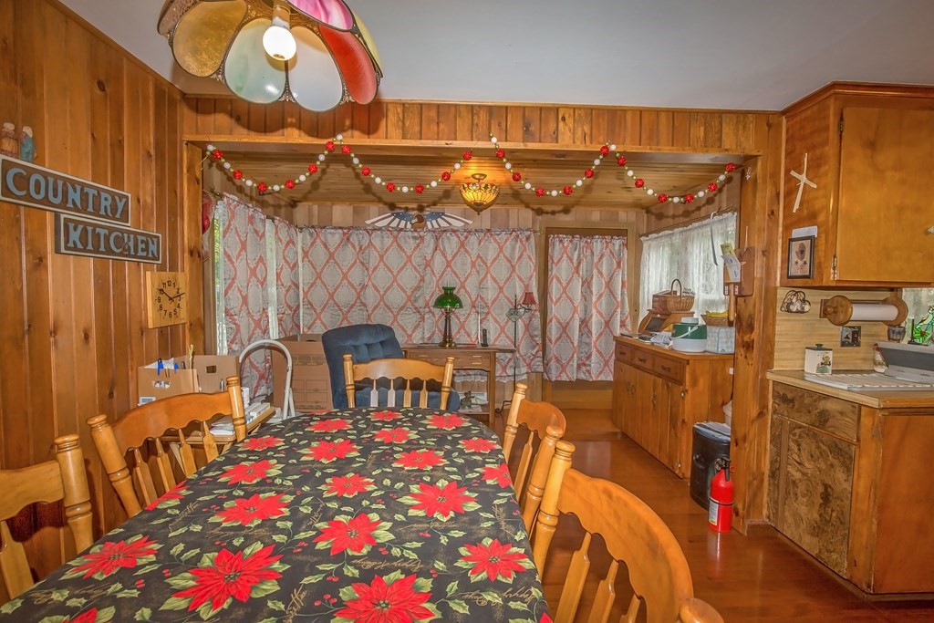 165 Bacon Road Springfield, MA 01119 - Photo 22 of 40 a dining room with furniture and wooden floor