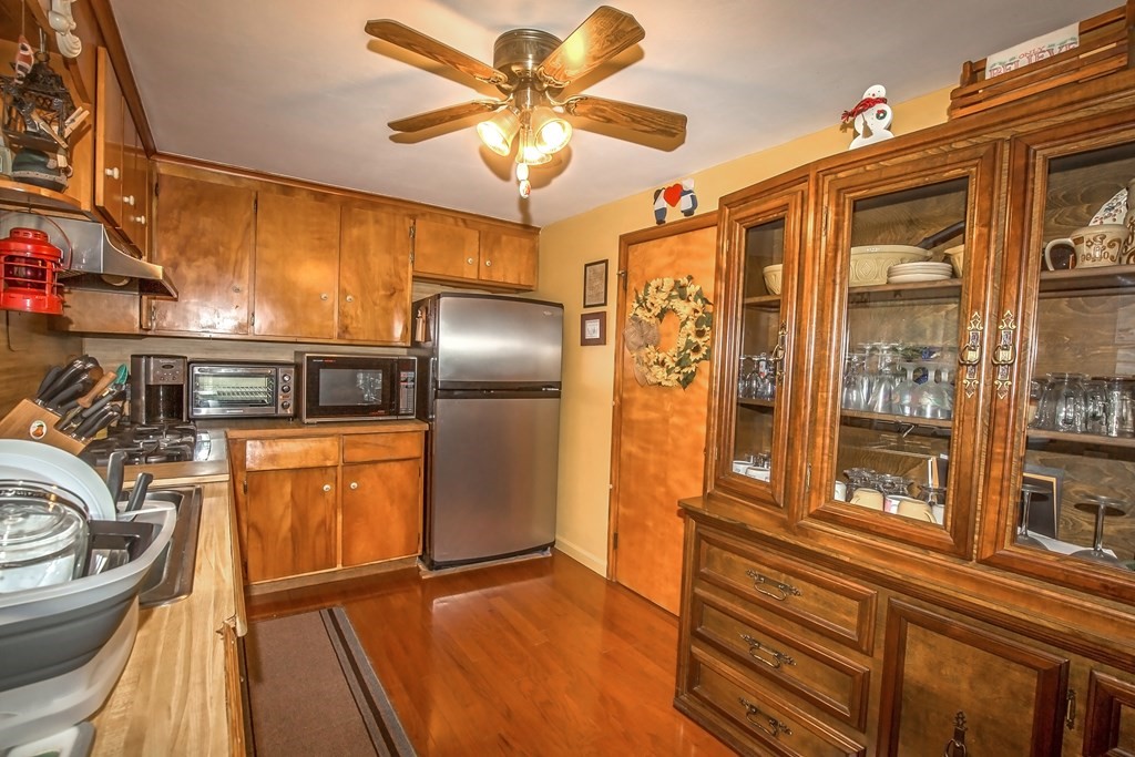 165 Bacon Road Springfield, MA 01119 - Photo 24 of 40 a kitchen with stainless steel appliances granite countertop a refrigerator and a sink