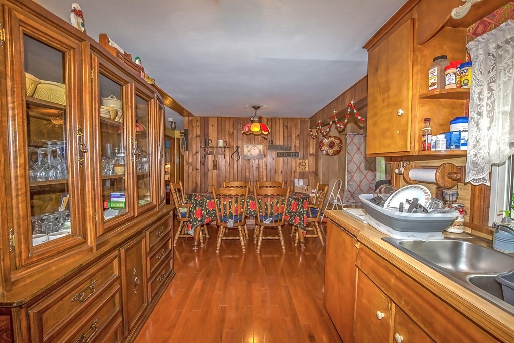 165 Bacon Road Springfield, MA 01119 - Photo 27 of 40 a dining room with furniture window and wooden floor