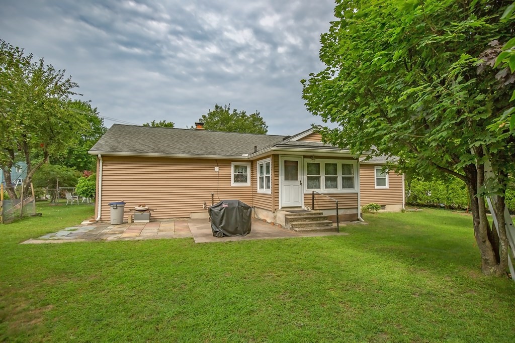 165 Bacon Road Springfield, MA 01119 - Photo 7 of 40 a front view of house with yard and outdoor seating