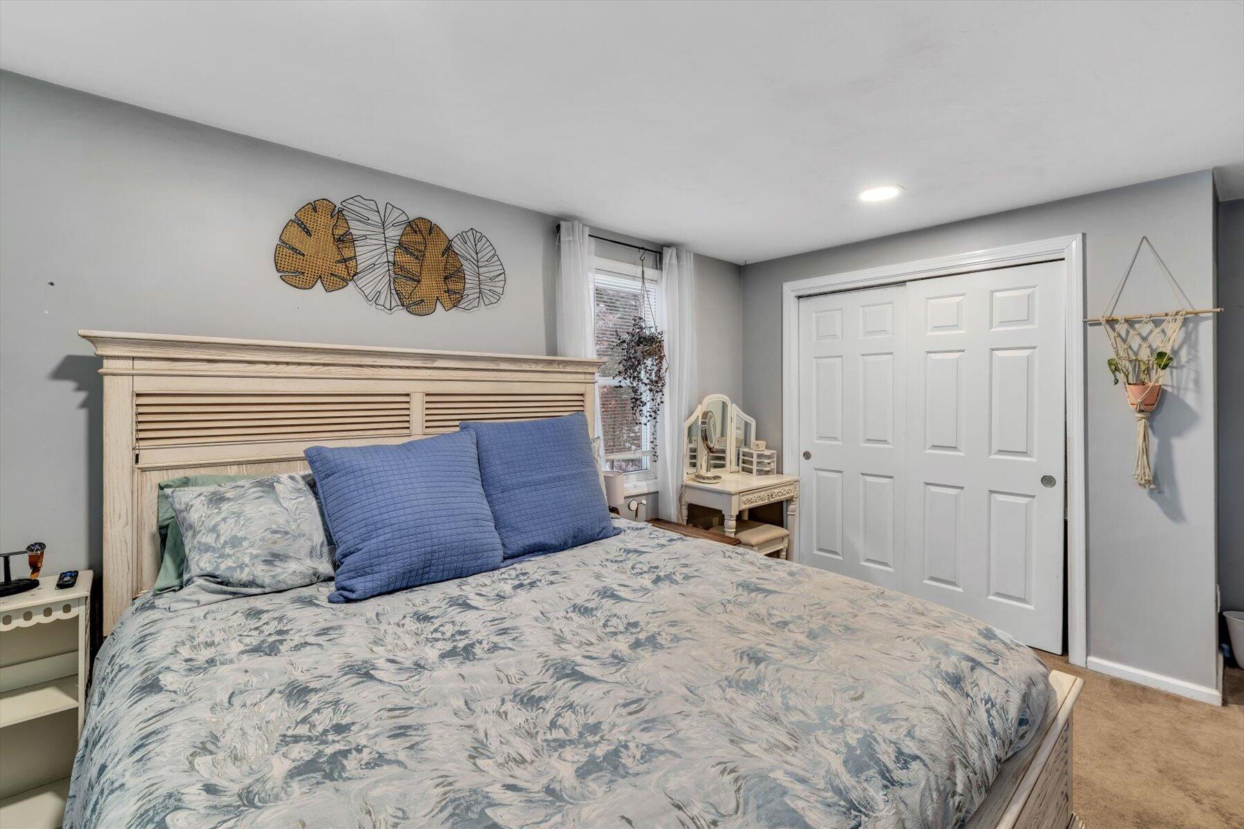 7 Summer Street Wareham, MA 02571 - Photo 16 of 41 a bedroom with a large bed and a window