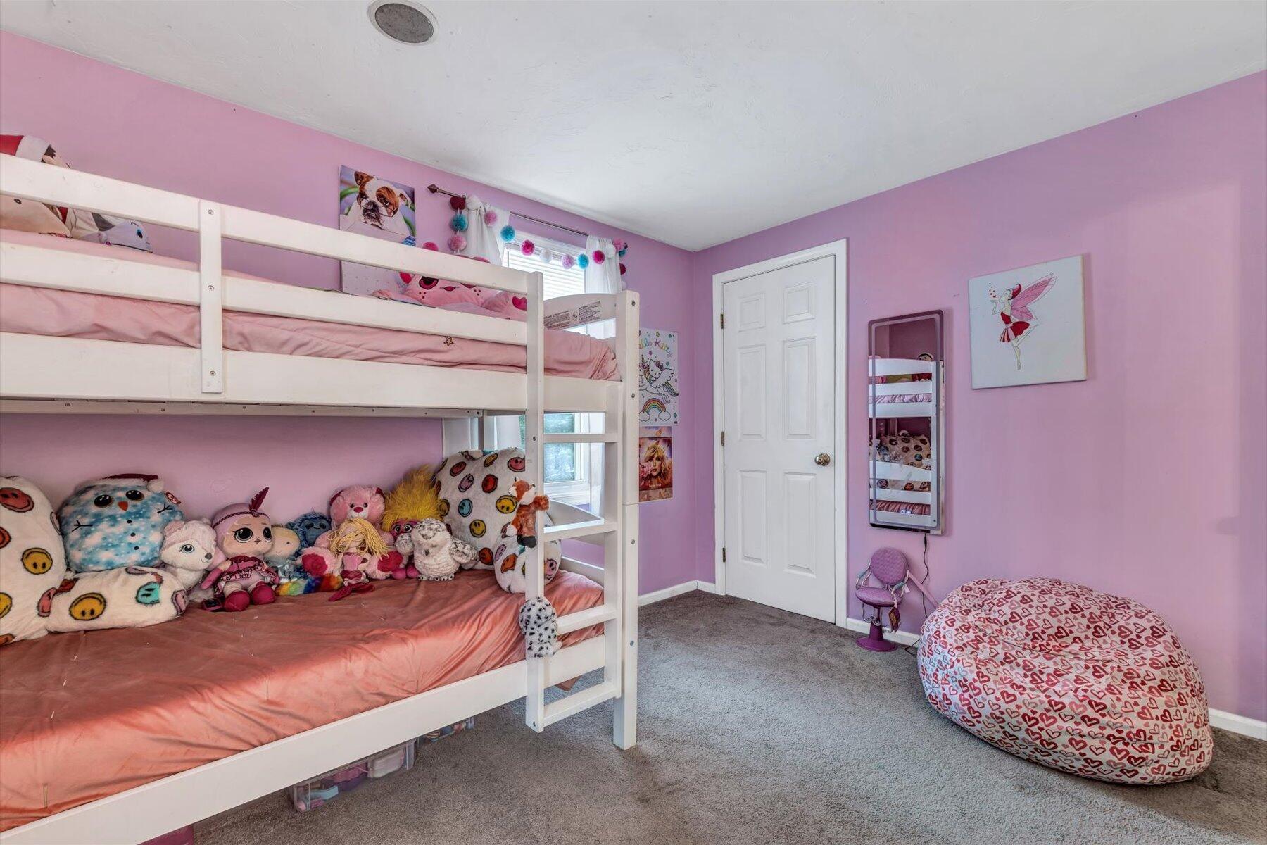 7 Summer Street Wareham, MA 02571 - Photo 24 of 41 a bedroom with furniture and a baby crib