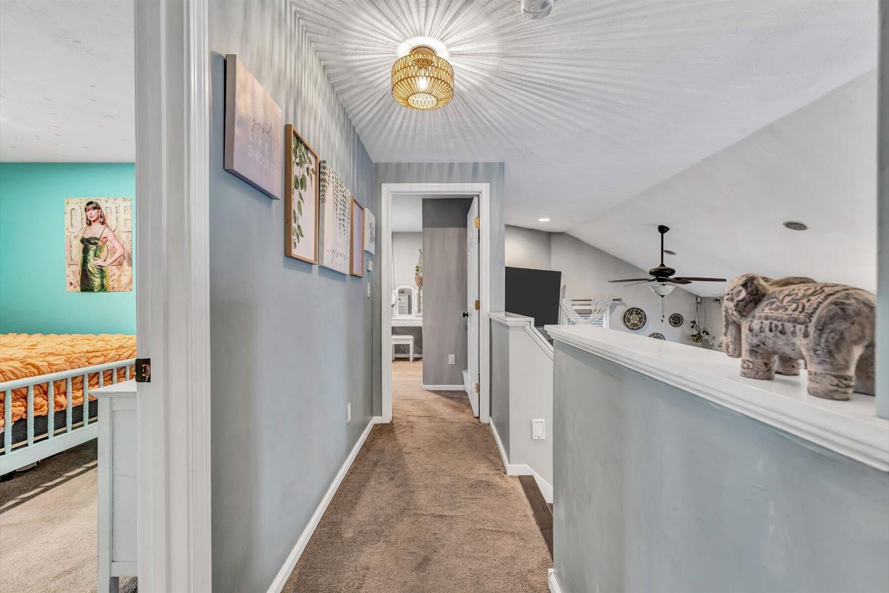 7 Summer Street Wareham, MA 02571 - Photo 27 of 41 a view of a hallway to a livingroom with furniture
