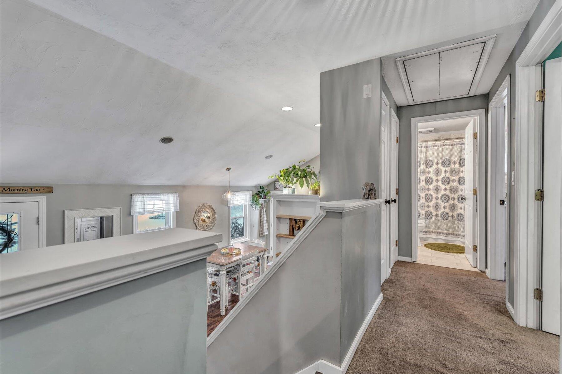 7 Summer Street Wareham, MA 02571 - Photo 28 of 41 a view of a hallway with windows and stairs