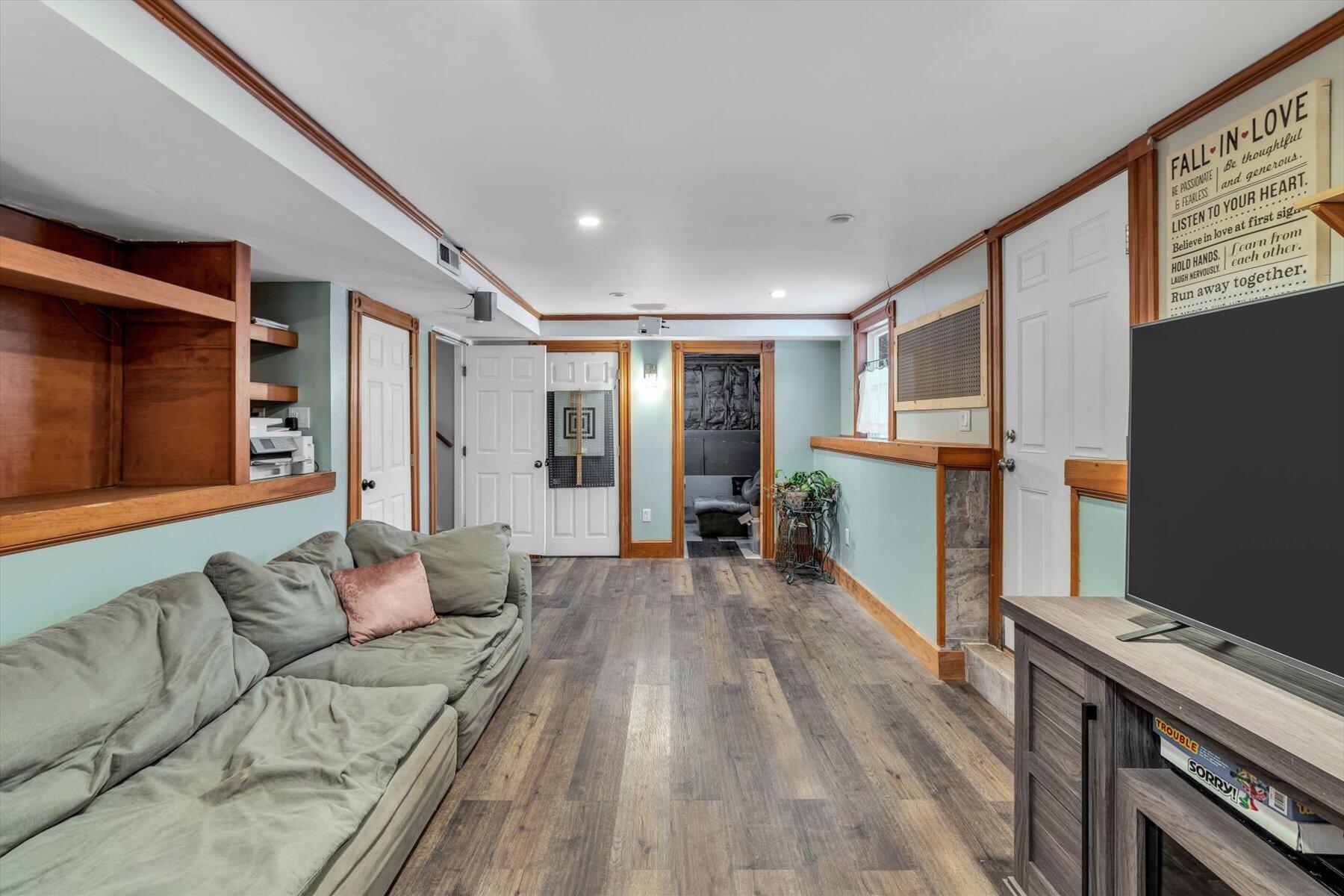 7 Summer Street Wareham, MA 02571 - Photo 29 of 41 a living room with furniture and a flat screen tv