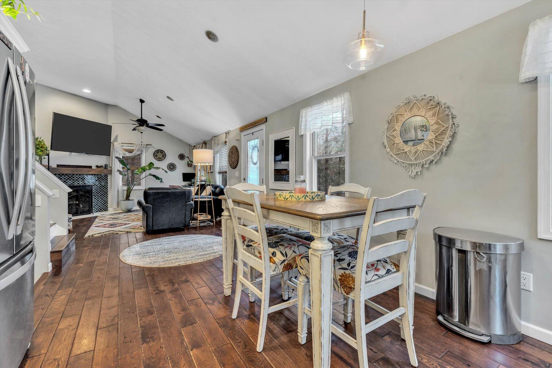 7 Summer Street Wareham, MA 02571 - Photo 7 of 41 a living room with furniture a flat screen tv and kitchen view