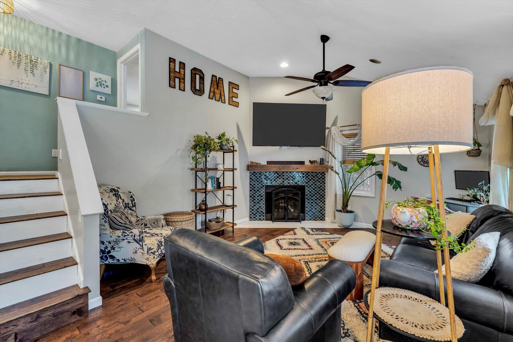 7 Summer Street Wareham, MA 02571 - Photo 10 of 41 a living room with furniture a fireplace and a flat screen tv