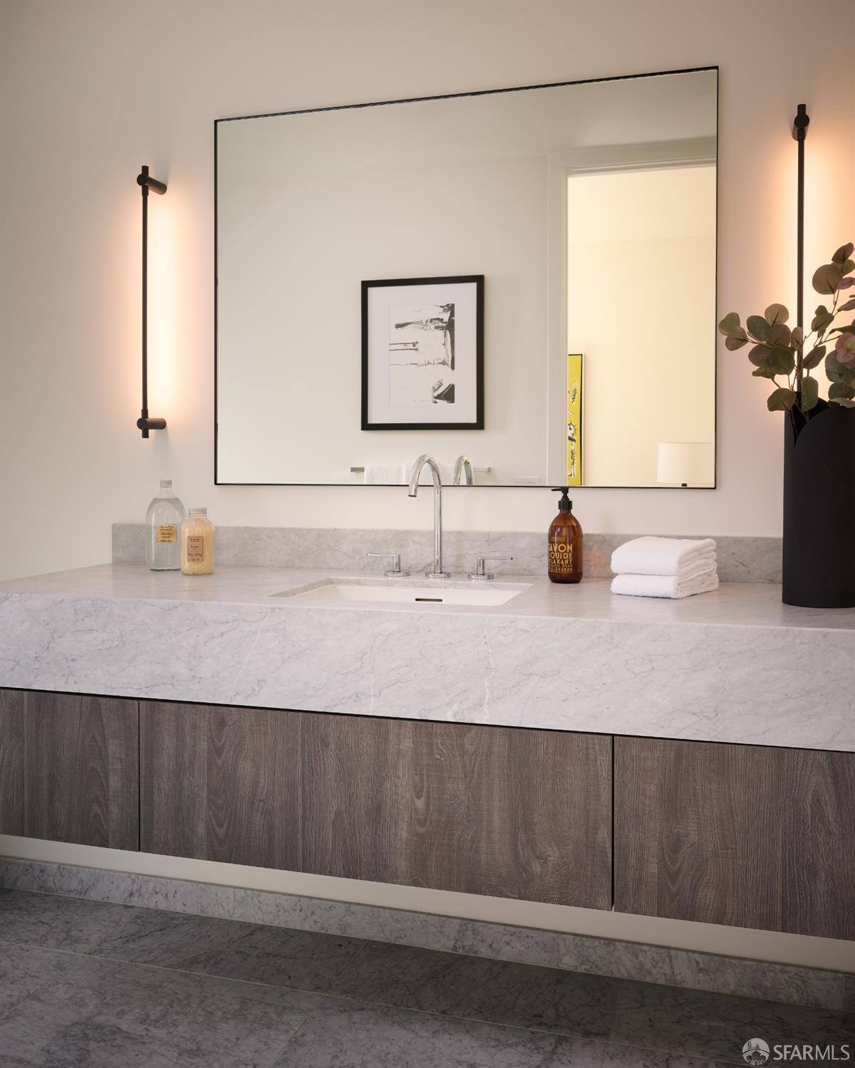 38 Meadow Drive, Unit 3 San Francisco, CA 94130 - Photo 20 of 52 a bathroom with a sink and a mirror