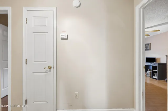a view of a livingroom with wooden floor