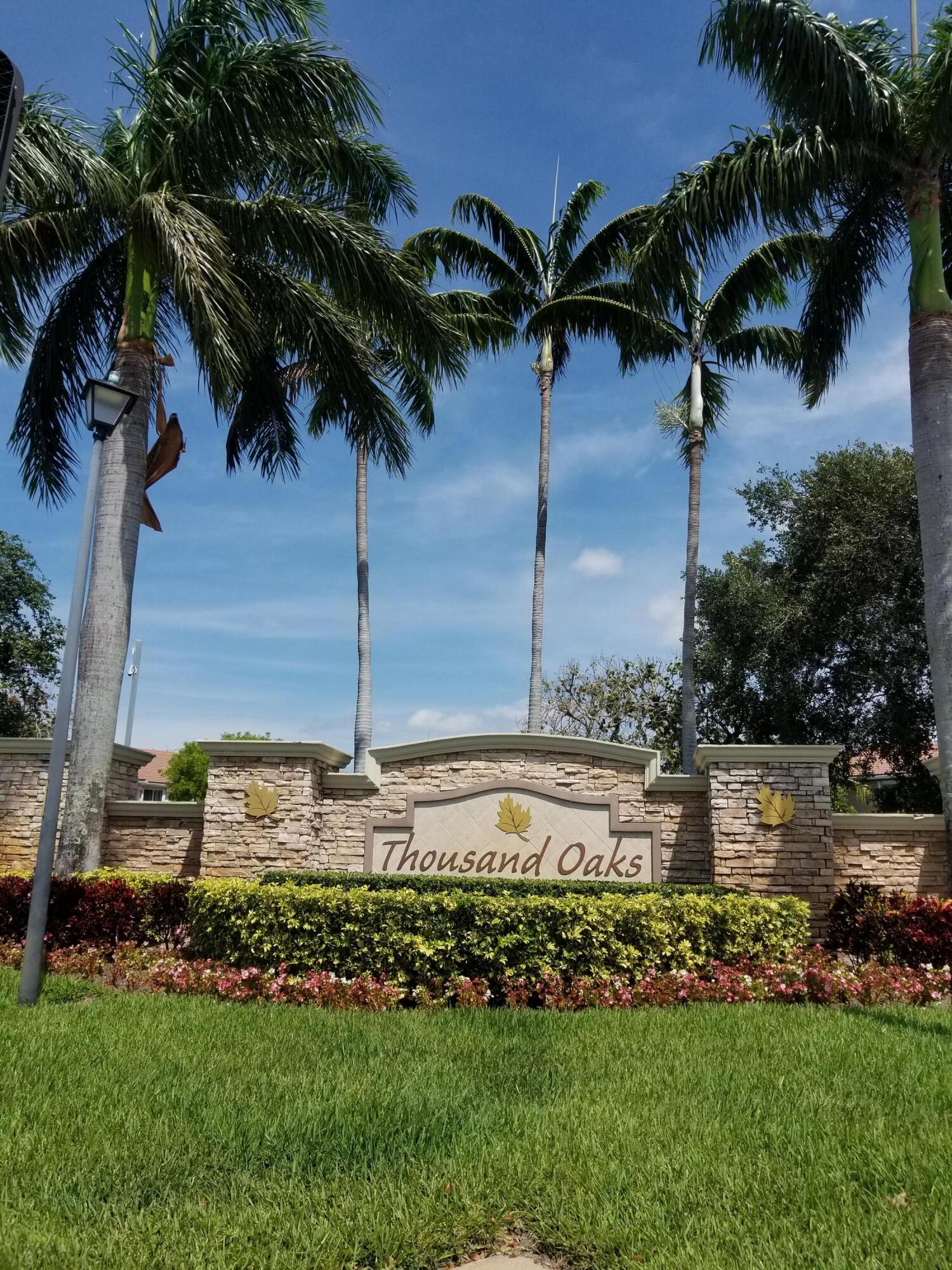 3195 Laurel Ridge Circle Riviera Beach, FL 33404 - Photo 1 of 52 Front of Community