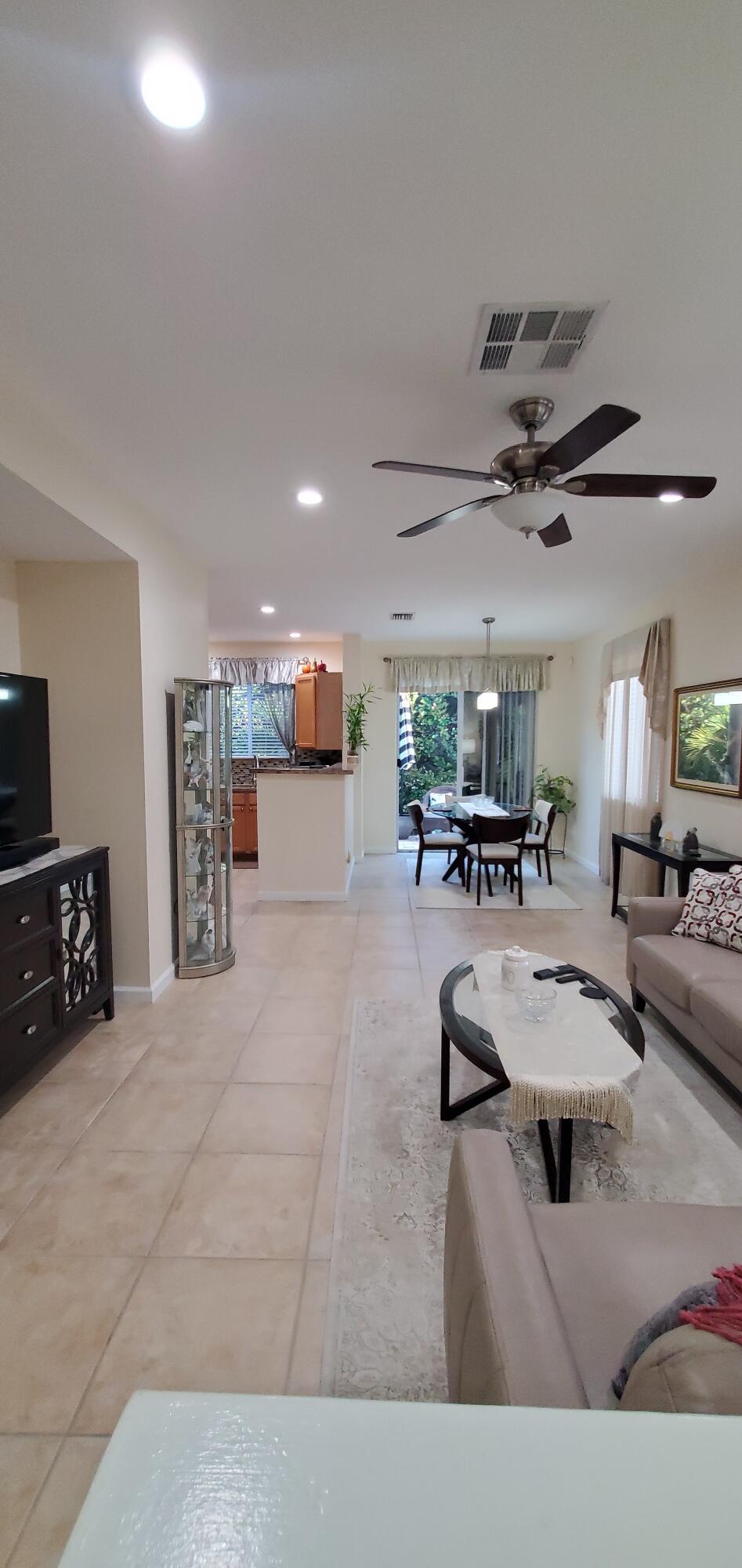 3195 Laurel Ridge Circle Riviera Beach, FL 33404 - Photo 11 of 52 living room
